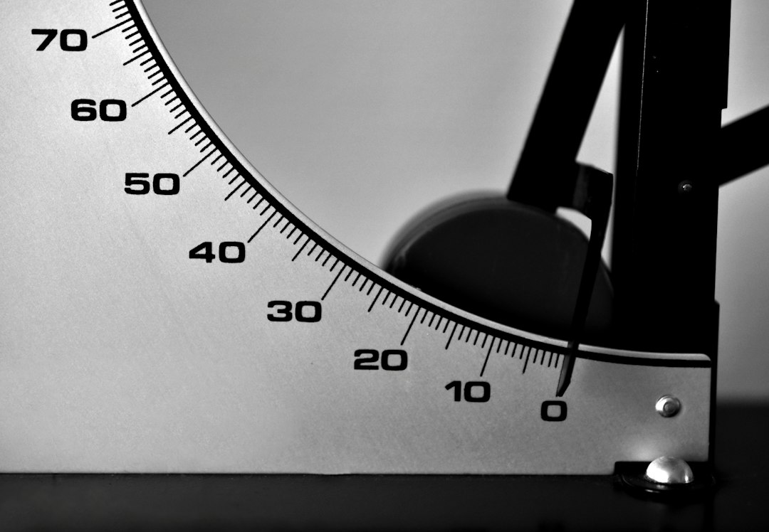 The dial of a hand grip dynamometer waiting to measure a baseline grip score