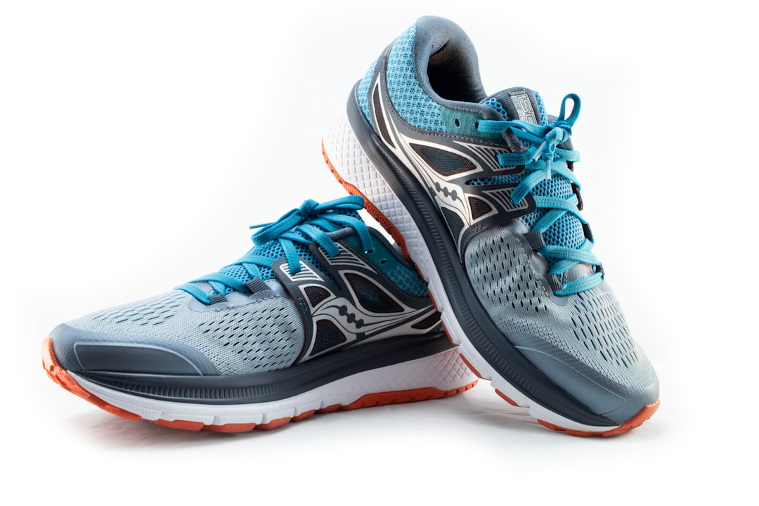 Studio shot of running shoes showing cushioned midsole