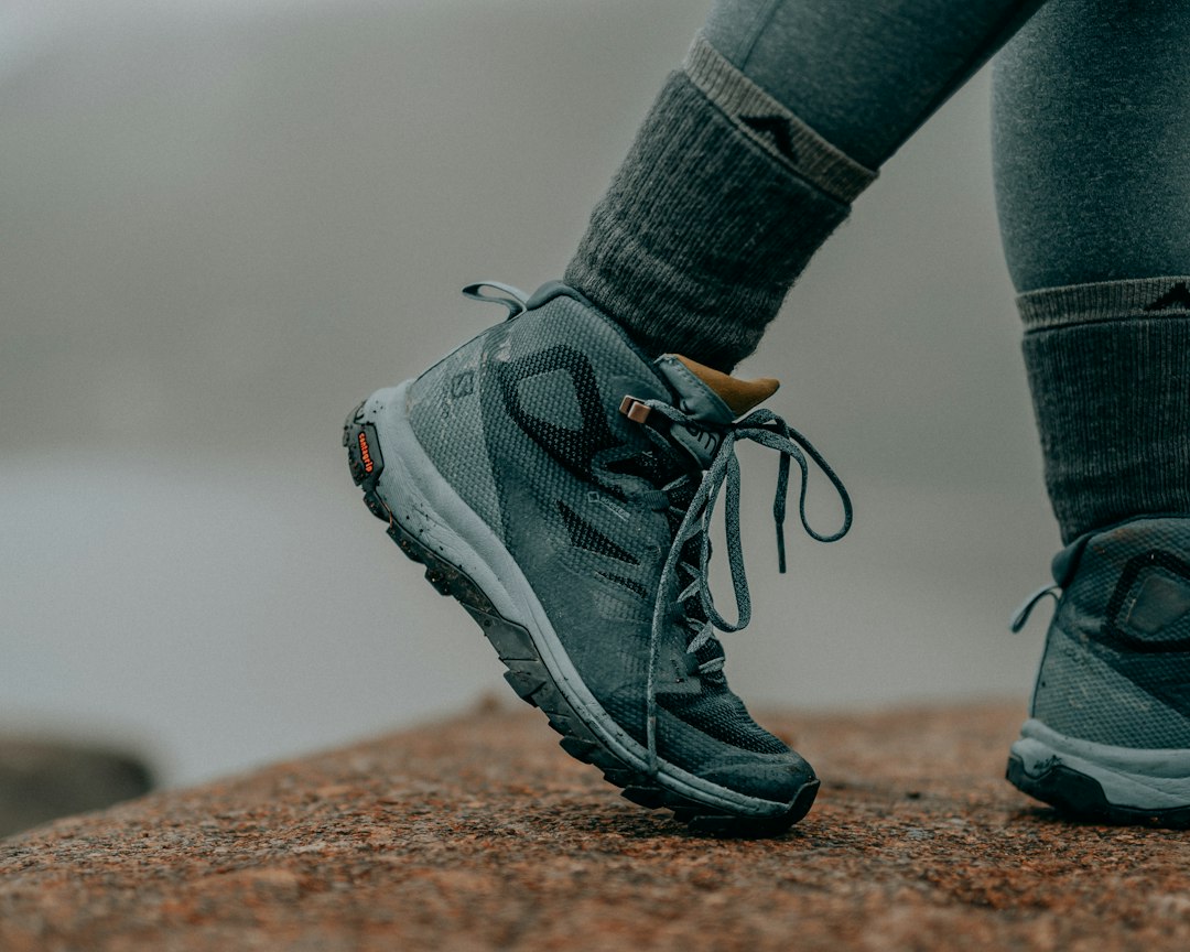 Close-up of hiking socks laced into a boot
