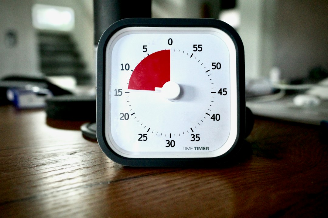 Digital gym timer clock counting intervals on a gym wall