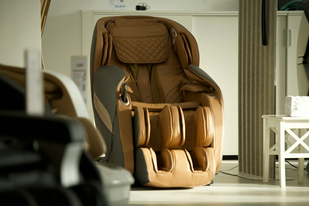 Brown leather massage chair in a showroom