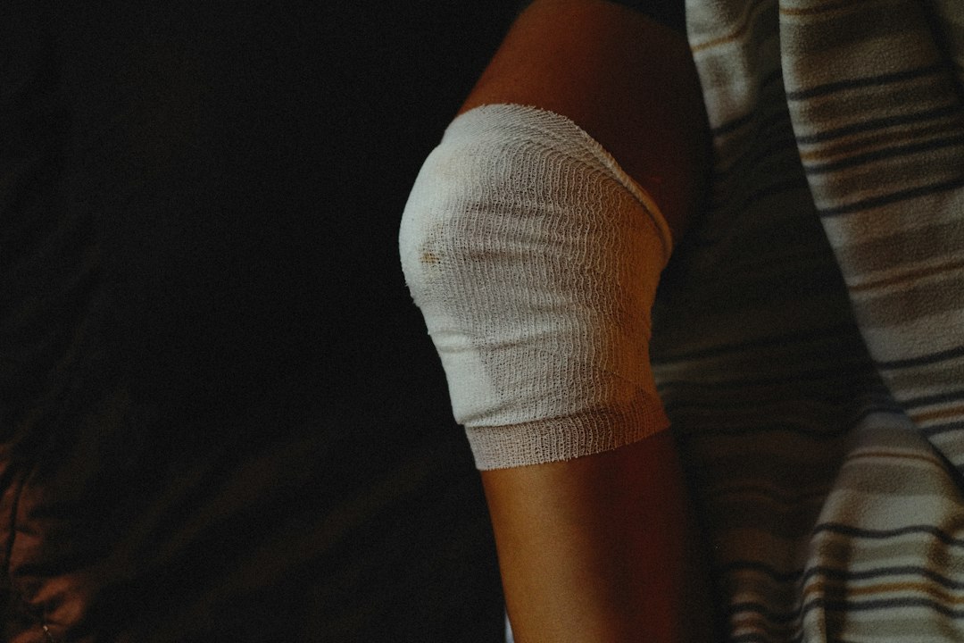 An elastic bandage wrapped around a knee after training