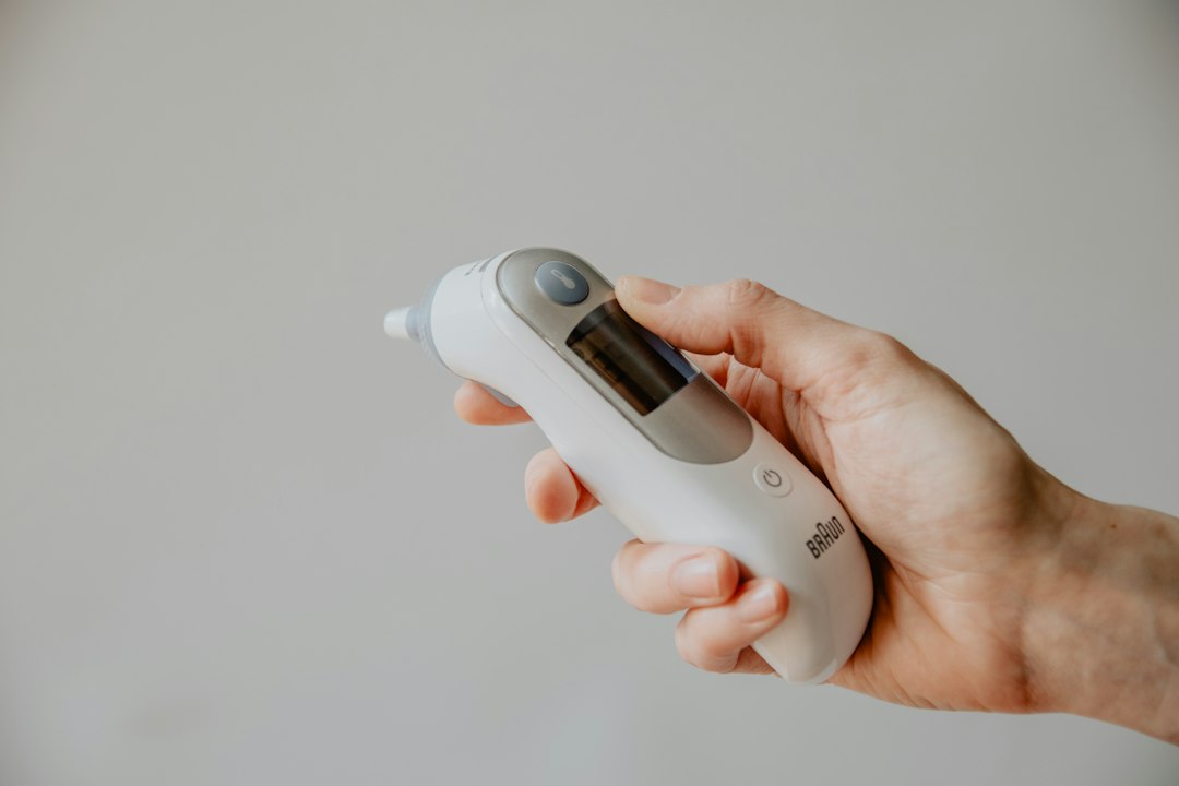 A thermometer taking a reading