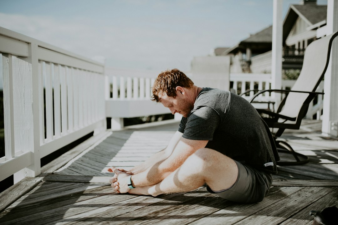 A person stretching at home