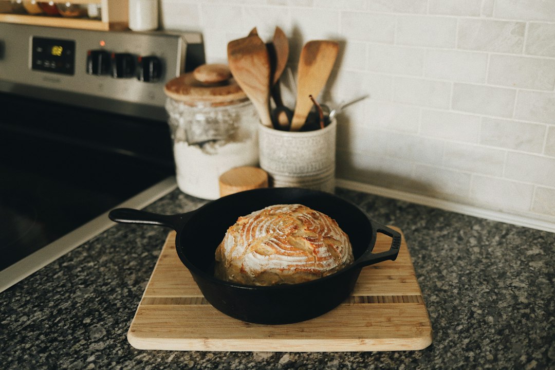 Cornbread baking in a seasoned cast iron pan