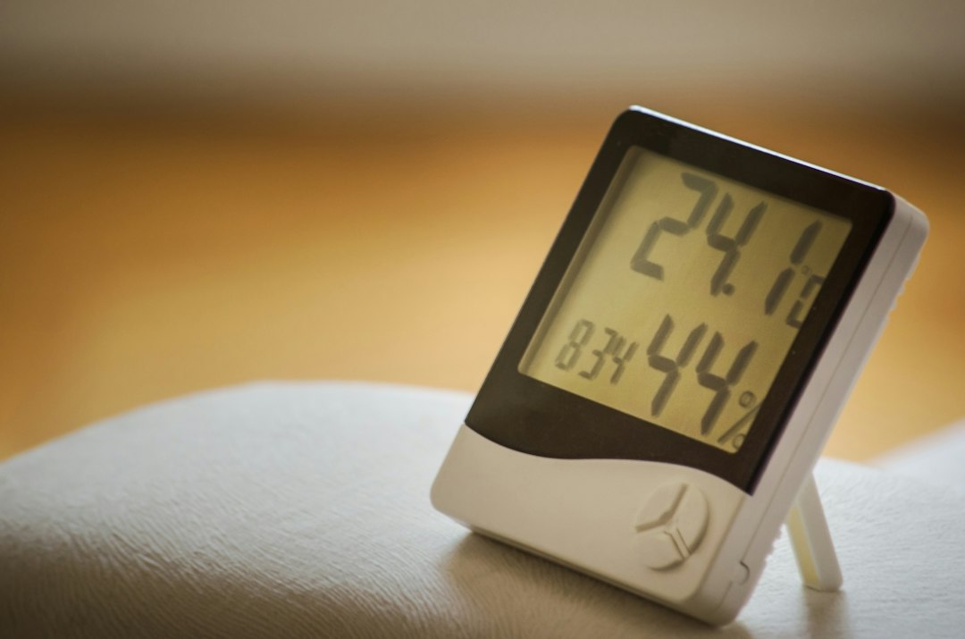 Digital hygrometer displaying 44 percent humidity